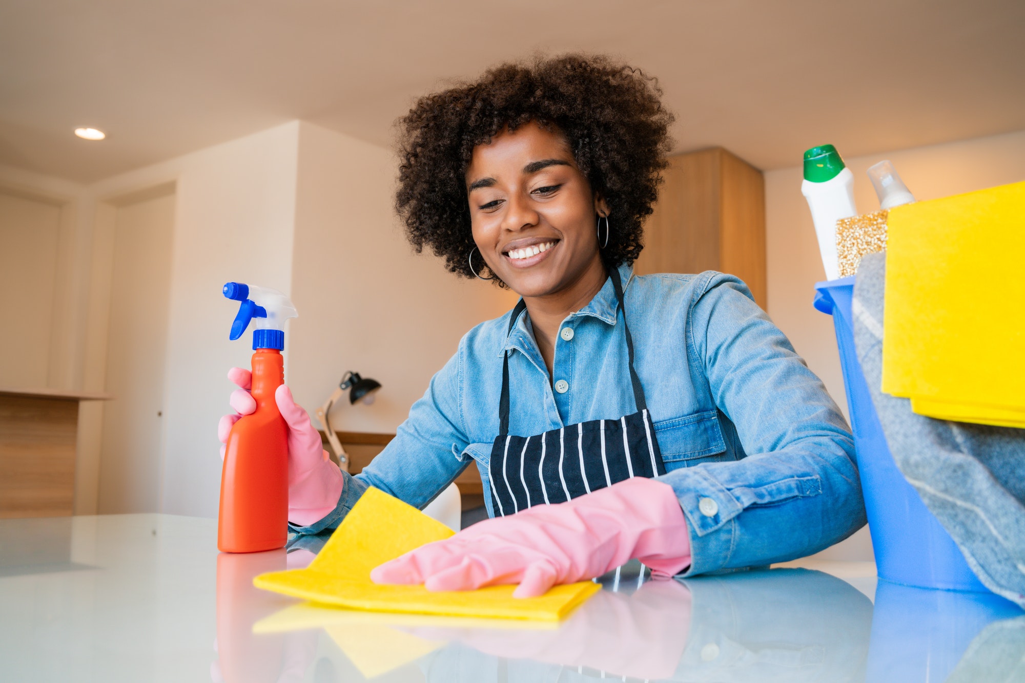 afro-woman-cleaning-new-home-.jpg